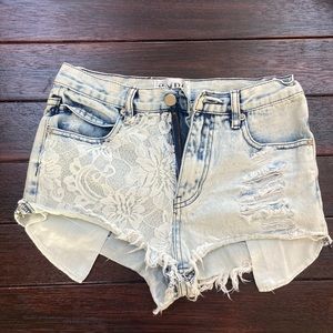 Lace pocketed denim shorts